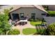 Backyard offers an outdoor seating area, BBQ, gazebo and verdant landscaping creating a backyard space for socializing at 3578 E Walnut Rd, Gilbert, AZ 85298