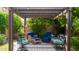 Secluded backyard retreat with shaded pergola and comfortable seating at 3578 E Walnut Rd, Gilbert, AZ 85298