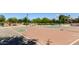 Well-maintained basketball court within the community park, surrounded by trees and landscaping at 3578 E Walnut Rd, Gilbert, AZ 85298