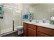 Bathroom featuring a glass-enclosed shower and modern fixtures at 3578 E Walnut Rd, Gilbert, AZ 85298