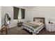 Bedroom with carpet flooring, and a window that provides natural light at 3578 E Walnut Rd, Gilbert, AZ 85298