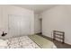 Bedroom with carpet flooring and a large closet perfect for extra storage at 3578 E Walnut Rd, Gilbert, AZ 85298