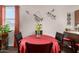 Cozy dining area with a round table, seating for four, and decorative wall art at 3578 E Walnut Rd, Gilbert, AZ 85298