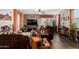 Inviting living room with hardwood floors, a ceiling fan, and stylish decor at 3578 E Walnut Rd, Gilbert, AZ 85298