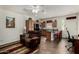 Inviting living room with modern kitchen and comfortable brown sofa at 3578 E Walnut Rd, Gilbert, AZ 85298