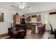 Cozy living space featuring an open kitchen and a comfortable sofa at 3578 E Walnut Rd, Gilbert, AZ 85298