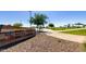 Gilbert Regional Park entrance with visible signage for event lawn, sand volleyball, mountain play area, and sports complex at 3578 E Walnut Rd, Gilbert, AZ 85298