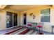 Covered patio with outdoor seating, perfect for relaxing and entertaining at 3578 E Walnut Rd, Gilbert, AZ 85298