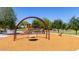 Community playground featuring a variety of equipment for children of all ages at 3578 E Walnut Rd, Gilbert, AZ 85298