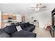 Spacious living area featuring kitchen, living room, and office nook at 39959 W Williams Way, Maricopa, AZ 85138