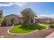 This gorgeous single-Gathering home is beautifully landscaped with vibrant plants and decorative stones at 4055 N Recker Rd # 62, Mesa, AZ 85215