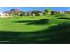 Expansive green golf course with rolling hills and mountain views, offering a serene and active lifestyle at 4055 N Recker Rd # 62, Mesa, AZ 85215