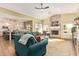 Inviting living room with vaulted ceilings, fireplace, and open concept design leading to the kitchen at 4055 N Recker Rd # 62, Mesa, AZ 85215
