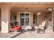 This covered patio features ample seating and sliding glass door access to the interior at 4055 N Recker Rd # 62, Mesa, AZ 85215