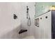 This shower features white tiled walls and a rainfall shower head at 4055 N Recker Rd # 62, Mesa, AZ 85215
