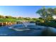 Beautiful water fountain on the golf course, enhancing the community's aesthetic appeal and recreational amenities at 4055 N Recker Rd # 62, Mesa, AZ 85215