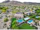 Aerial view of the property featuring a pool, basketball court, and other luxury amenities at 4417 W El Cortez Trl, Phoenix, AZ 85083