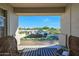 A backyard patio and seating area, seen from the covered porch at 4417 W El Cortez Trl, Phoenix, AZ 85083