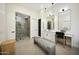 This primary bathroom features a walk-in shower, dual sink vanity, and makeup vanity area at 4417 W El Cortez Trl, Phoenix, AZ 85083