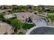 Beautifully landscaped property with lush green lawn, hardscape, and three-car garage at 4417 W El Cortez Trl, Phoenix, AZ 85083