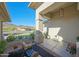 Front porch with stylish pillars, chairs, and desert landscaping creating an inviting entrance at 4417 W El Cortez Trl, Phoenix, AZ 85083
