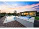 Inviting backyard pool and spa with a beautiful sunset backdrop at 4417 W El Cortez Trl, Phoenix, AZ 85083