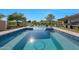 Backyard pool and spa area with water features and meticulous landscaping at 4417 W El Cortez Trl, Phoenix, AZ 85083