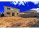 Large backyard awaits landscaping, offering a blank slate for your dream outdoor oasis and relaxation at 45018 W Sage Brush Dr, Maricopa, AZ 85139