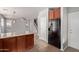 Modern kitchen showcasing a breakfast bar, black appliances and easy access to living areas perfect for entertaining at 45018 W Sage Brush Dr, Maricopa, AZ 85139