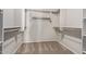 Spacious walk-in closet with built-in shelving and ample storage space at 45018 W Sage Brush Dr, Maricopa, AZ 85139