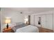 Cozy bedroom with hardwood floors, neutral paint, and closet at 4630 N 68Th St # 265, Scottsdale, AZ 85251