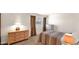 Bedroom features a neutral color scheme, bright window, and stylish furniture at 4630 N 68Th St # 265, Scottsdale, AZ 85251