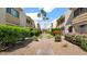 Well-maintained community with lush landscaping and a central walkway at 4630 N 68Th St # 265, Scottsdale, AZ 85251