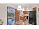 Eat-in kitchen with a bright window and quaint decor at 4630 N 68Th St # 265, Scottsdale, AZ 85251