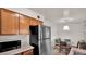 Cozy kitchen featuring stainless steel appliances and an adjacent dining area at 4630 N 68Th St # 265, Scottsdale, AZ 85251