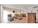 A Comfortable living room featuring a mix of seating and a retro-style bar at 4630 N 68Th St # 265, Scottsdale, AZ 85251