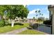 Beautiful community pool area with seating, lush landscaping and blue sky at 4630 N 68Th St # 265, Scottsdale, AZ 85251