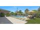 Resort-style backyard with pool, water feature, and lounge seating, perfect for outdoor entertainment and relaxation at 4714 E Lewis Ave, Phoenix, AZ 85008
