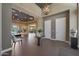 Grand foyer with high ceilings, elegant lighting, and an open floor plan with views to the back patio at 4714 E Lewis Ave, Phoenix, AZ 85008
