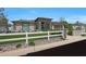 Charming home featuring a well-manicured lawn, desert landscaping, and a modern exterior elevation at 4714 E Lewis Ave, Phoenix, AZ 85008