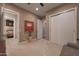 Hallway showcasing neutral colors, tile flooring, closet and doorways to other rooms at 4714 E Lewis Ave, Phoenix, AZ 85008