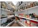 Organized pantry with abundant shelving provides ample storage for all your kitchen essentials at 4714 E Lewis Ave, Phoenix, AZ 85008