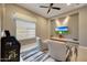 Cozy sitting room with a built-in media niche, comfortable seating, and neutral tones at 4714 E Lewis Ave, Phoenix, AZ 85008
