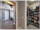 Well-organized walk-in closet with shelving, drawers, and ample storage space at 4714 E Lewis Ave, Phoenix, AZ 85008