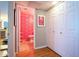 Unique bathroom with pink flamingo decor, colorful walls, and a pedestal sink at 5102 N 31St Pl # 432, Phoenix, AZ 85016