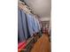 Organized walk-in closet with shelving and hanging space for clothing and shoes at 5102 N 31St Pl # 432, Phoenix, AZ 85016