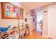 Inviting entryway with a glass console table, art and decor leading to the main living area at 5102 N 31St Pl # 432, Phoenix, AZ 85016