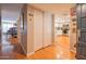 Inviting hallway leading to an open-concept living area with a modern kitchen at 5102 N 31St Pl # 432, Phoenix, AZ 85016