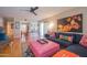 Stylish living room with hardwood floors, comfortable seating, and unique decor at 5102 N 31St Pl # 432, Phoenix, AZ 85016