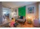 Eclectic living room with artistic accents, natural light, and hardwood floors at 5102 N 31St Pl # 432, Phoenix, AZ 85016